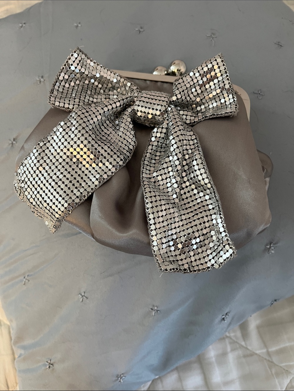 Claire's Silver Sequin Bow Wristlet Clutch
